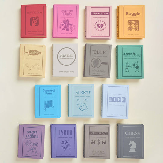 Collection of colorful board game boxes on a light background