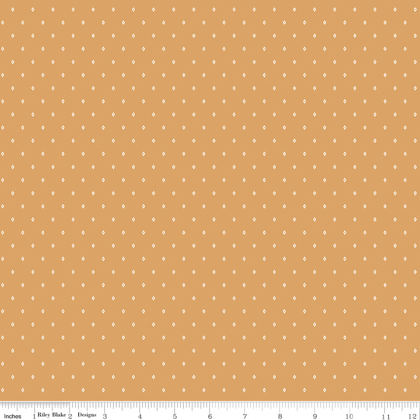 Diamond Butternut WN18963 fabric shown with an inch ruler for scale