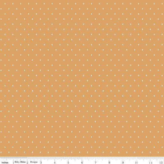 Diamond Butternut WN18963 fabric shown with an inch ruler for scale