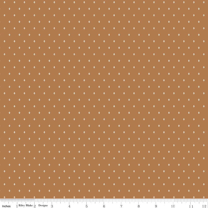 Diamond Ginger WN18963 fabric shown with an inch ruler for scale
