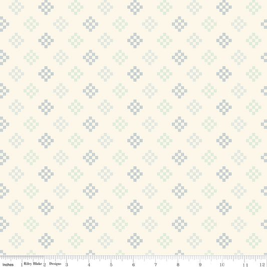 Patchwork Winter WN18964 woven fabric shown with an inch ruler for scale