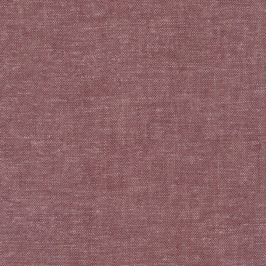 Solid mauve color swatch with a textured pattern