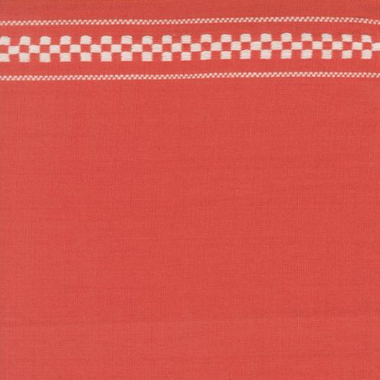 Red fabric with white checkered border