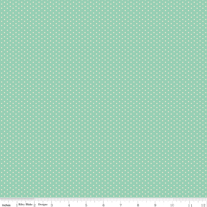 Mint WN18962 woven fabric shown with an inch ruler for scale