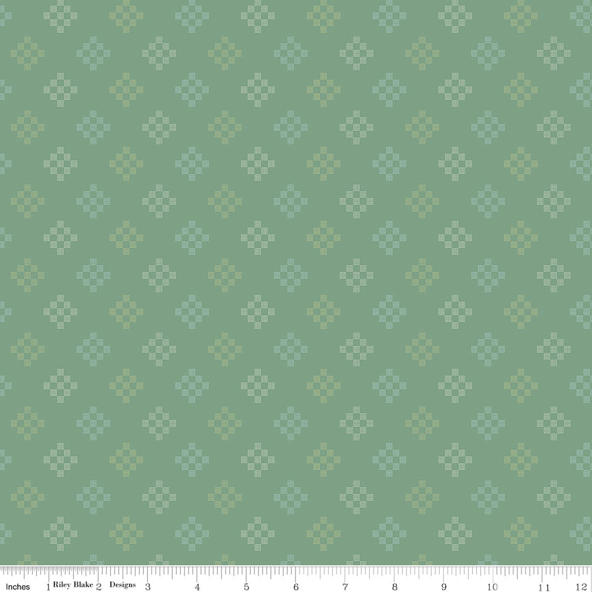 Patchwork Pine WN18964 woven fabric shown with an inch ruler for scale