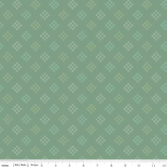 Patchwork Pine WN18964 woven fabric shown with an inch ruler for scale