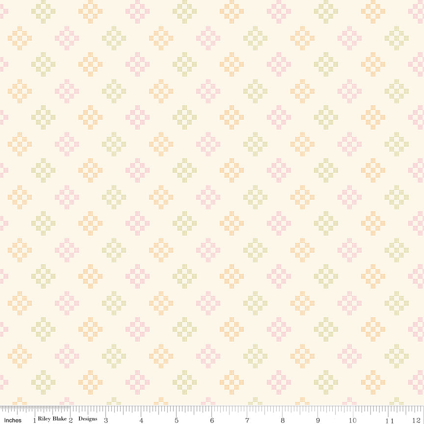 Patchwork Summer WN18964 woven fabric shown with an inch ruler for scale