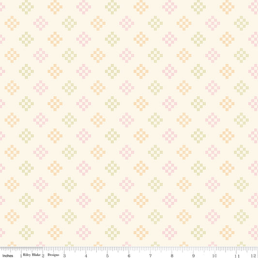 Patchwork Summer WN18964 woven fabric shown with an inch ruler for scale